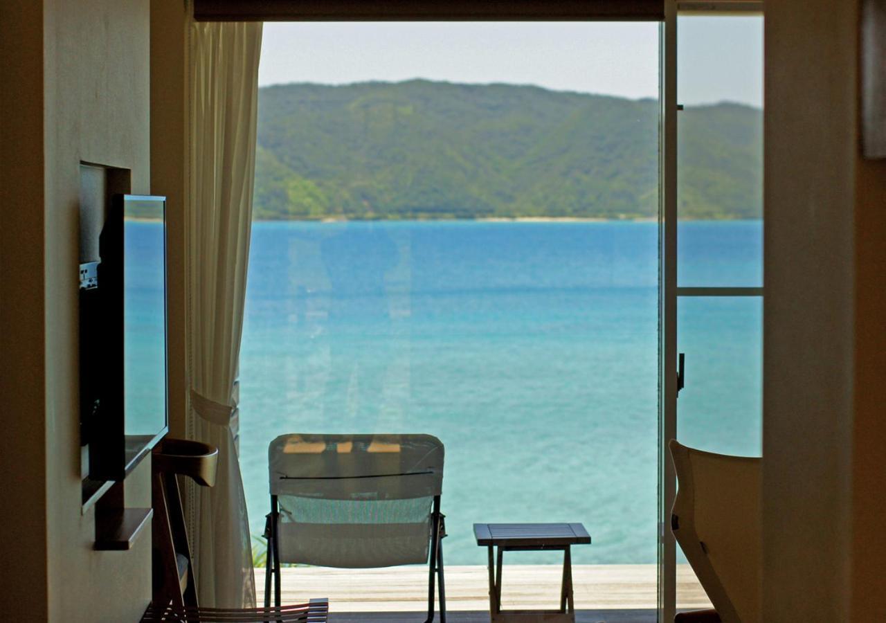 Miru Amami Hotel Tatsugo Bagian luar foto