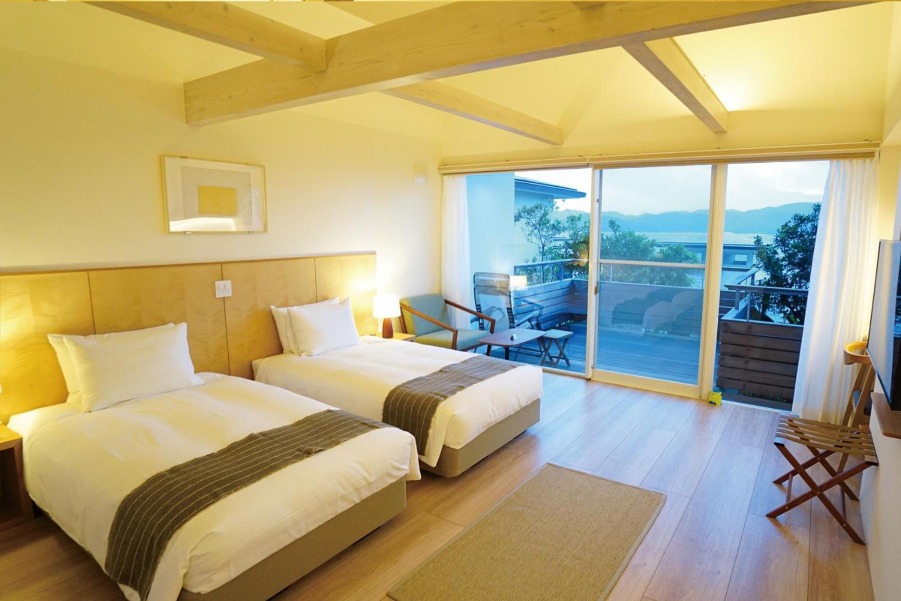 Miru Amami Hotel Tatsugo Bagian luar foto