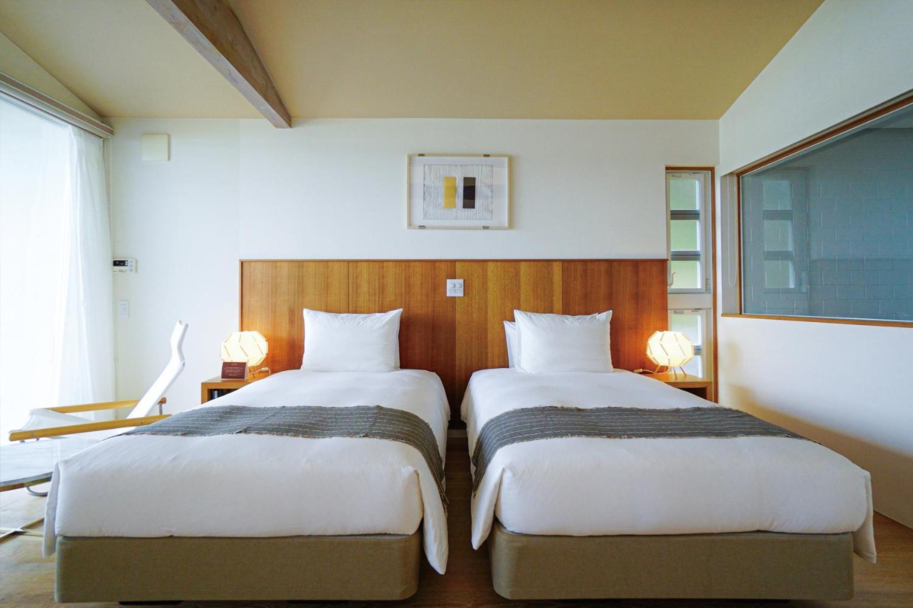 Miru Amami Hotel Tatsugo Bagian luar foto