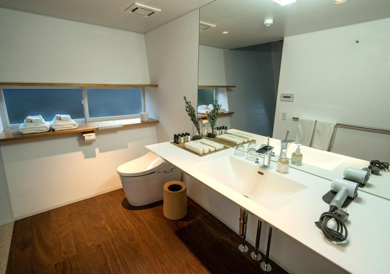 Miru Amami Hotel Tatsugo Ruang foto