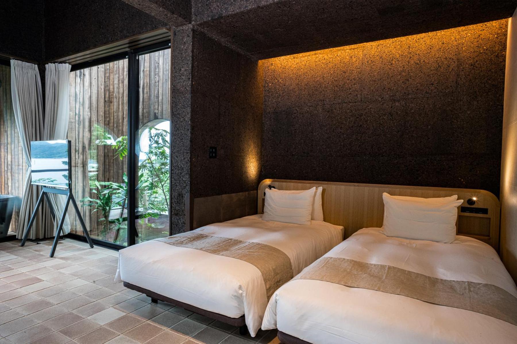 Miru Amami Hotel Tatsugo Bagian luar foto