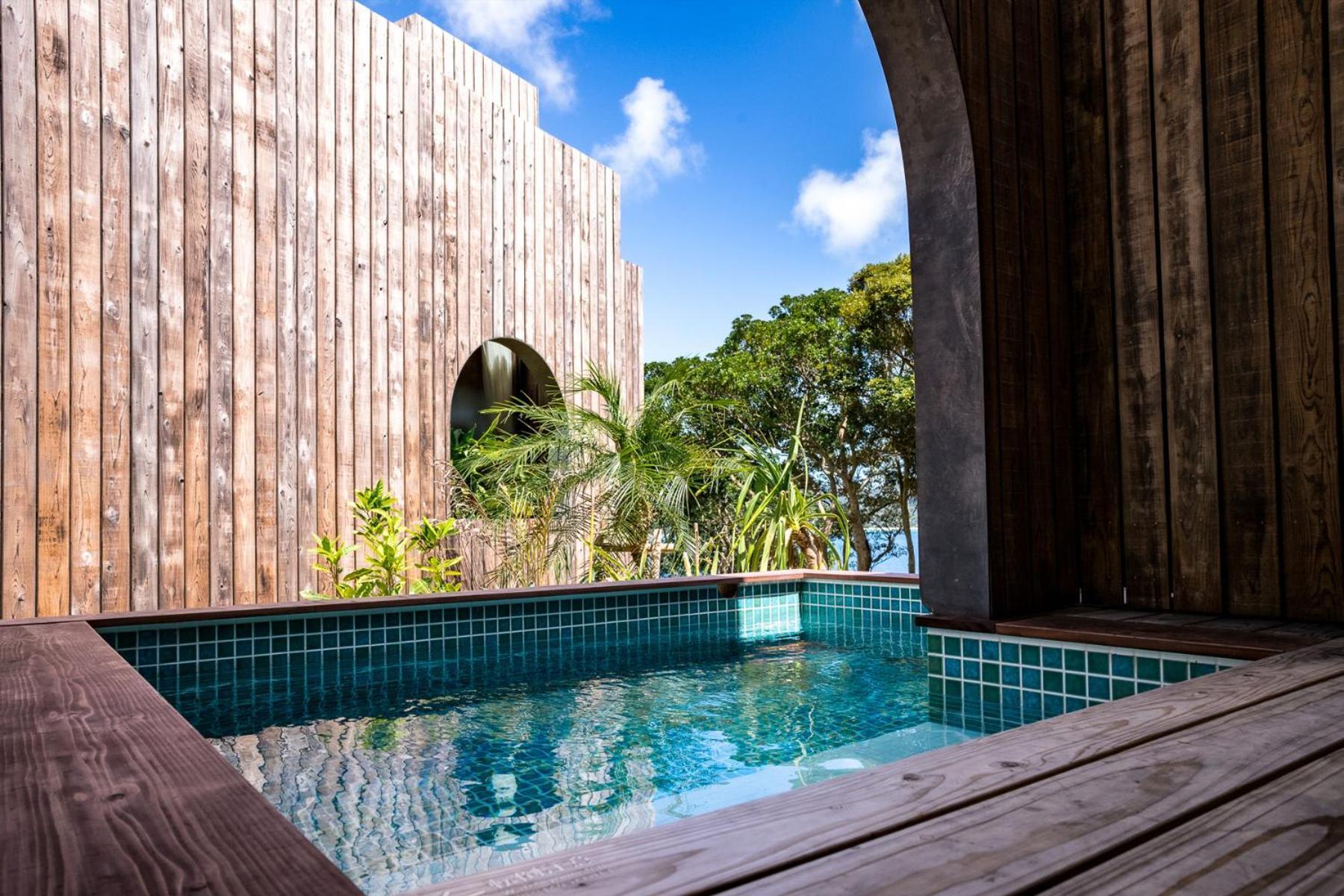 Miru Amami Hotel Tatsugo Bagian luar foto