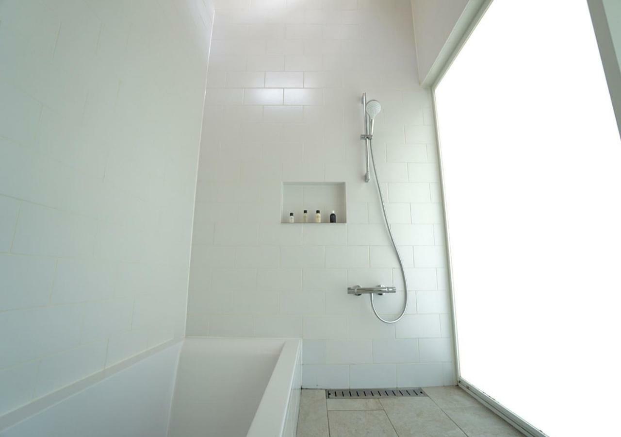 Miru Amami Hotel Tatsugo Bagian luar foto
