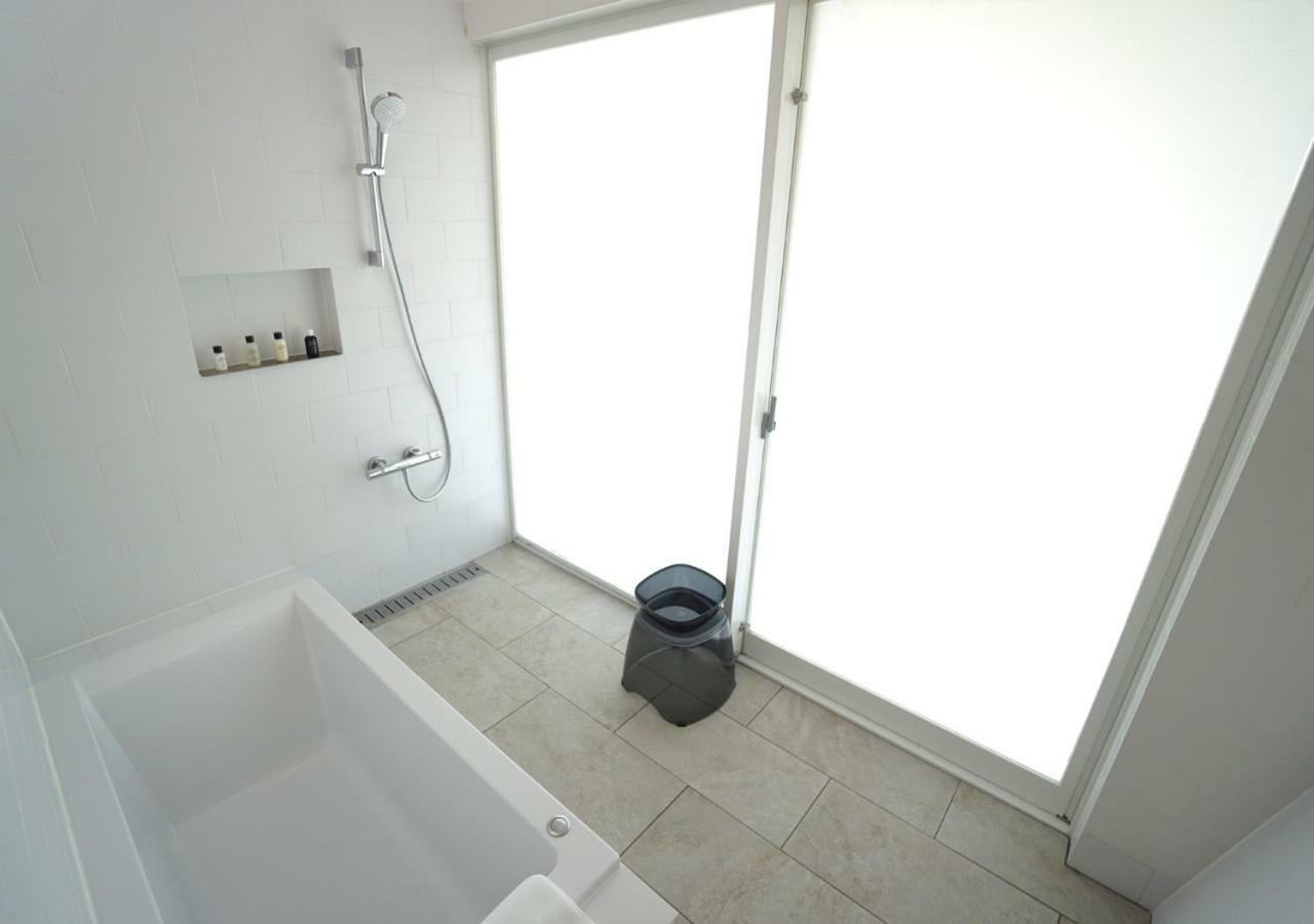 Miru Amami Hotel Tatsugo Bagian luar foto
